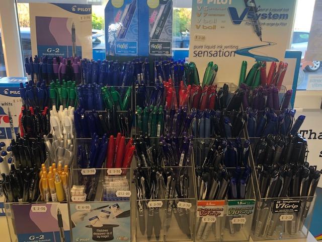 A display of colourful pens inside the stationery shop